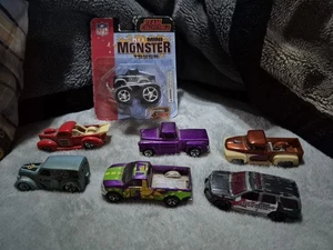 Hot Wheels Konvolut - 7 Autos, verschiedene Serien Raiders Mini Monster Truck - Bild 1 von 8
