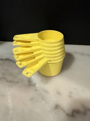 TUPPERWARE Yellow MEASURING CUPS SET OF 6 Vintage - Image 1 of 3