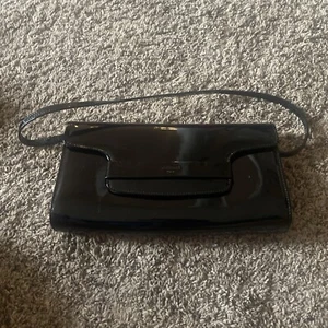 L. K. Bennett Ella Clutch Bag Black Patent Leather Strap From A Netflix Set - Picture 1 of 9