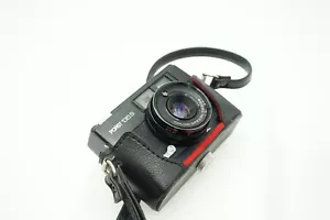 Schöne neuwertige Porst 135S Kamera schwarz, Color Special 2,7/38 mit Tasche - Bild 1 von 16