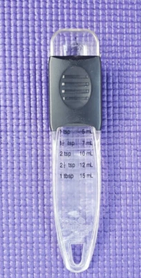 Cuchara medidora ajustable Pampered Chef Foto 1 de 2