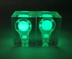 Set Of 2 Pierre Giraudon Glow in the Dark Light Bulb In Lucite Art GITD Bookends - Picture 1 of 9