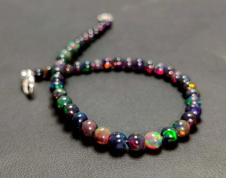 Natural Ethiopian Welo Fire Black Opal Plain Round 3-5mm Beads Gemstone Bracelet - Image 1 of 4