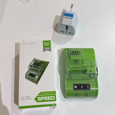 Universal Removable Recharge Battery Charger For Cellphones & Camera - Image 1 of 3