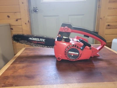 Motosierra Homelite XL pequeña roja con barra y cadena de 16" motosierra usada Foto 1 de 4