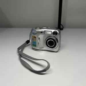 FOR PARTS Nikon COOLPIX 2100 2.0MP E2100 Digital Camera Silver Untested - Picture 1 of 9