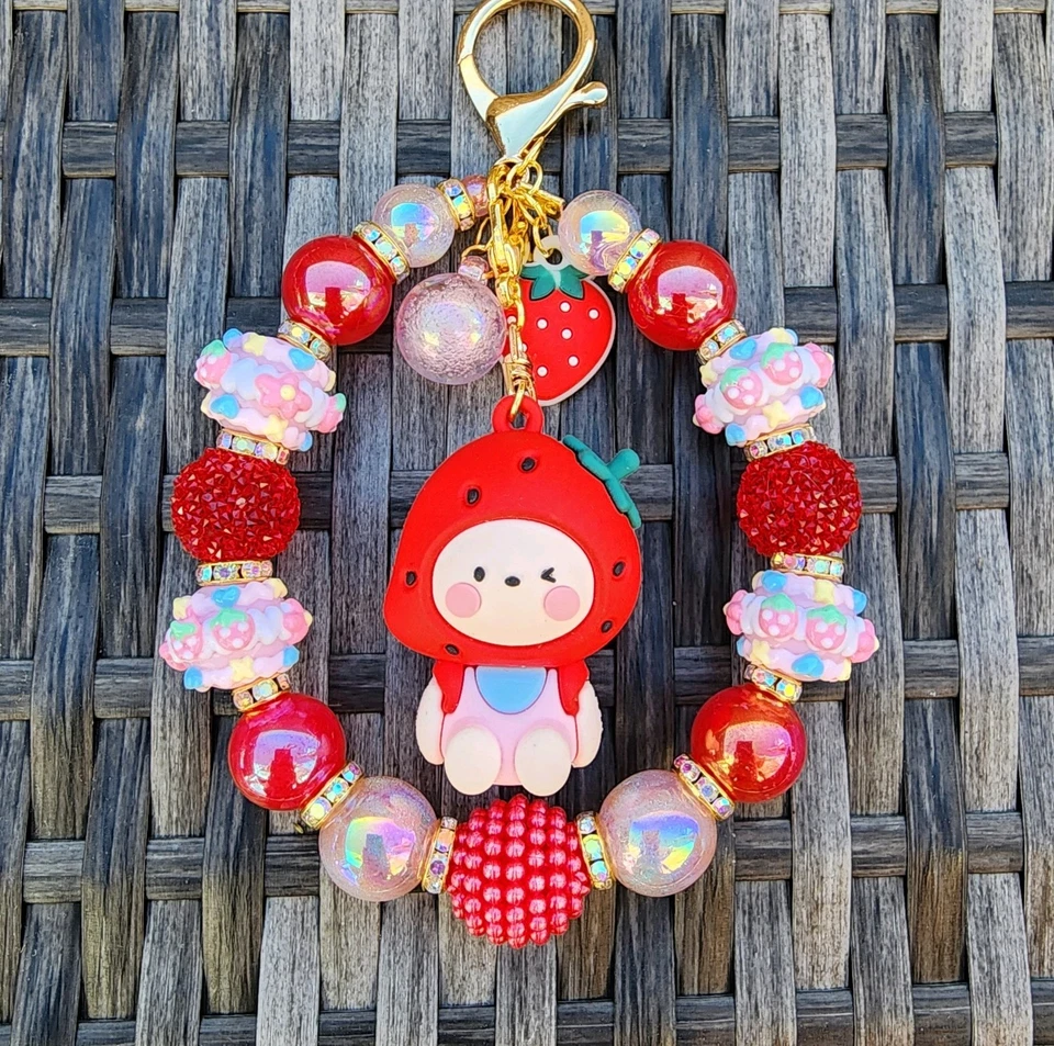 Llavero con cuentas, dije de bolso, dije de cartera, clip de bolso, dije de teléfono - niña fresa Foto 1 de 4