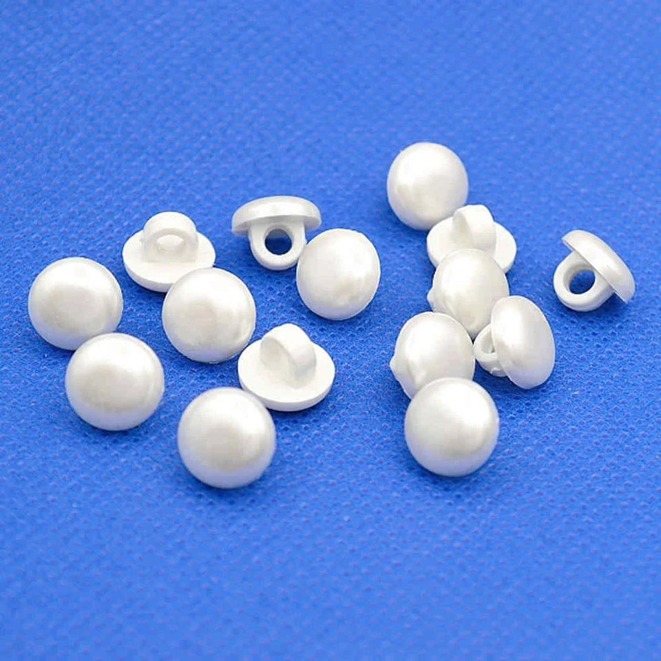 PEARLESCENT WHITE SHANK BUTTONS 10mm - Image 1 of 1