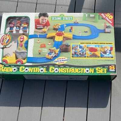 CONJUNTO DE CONSTRUÇÃO VINTAGE FISH PRICE SESAME STREET CONTROLE DE RÁDIO 2000 Novo - Imagem 1 de 4