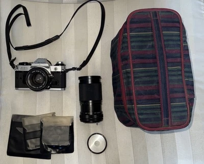 Canon AE-1 Program 35mm SLR Film Camera FD 50mm 1:1.8 Lens Flash & Bag Untested - Image 1 of 4