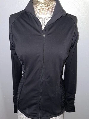 Chaqueta deportiva Victoria’s Secret VSX para mujer negra con cremallera reflectante agujeros para el pulgar Foto 1 de 4
