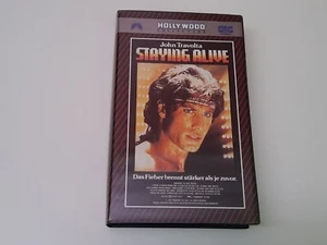 Staying Alive 1983 VHS German PAL Video Großbox John Travolta Sylvester Stallone - Bild 1 von 5