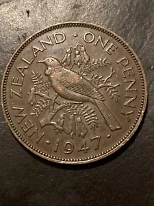 1947 New Zealand One Penny KM21 George VI Bronze Coin - Picture 1 of 2