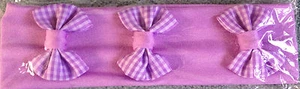 PINK BABY CHECK BOW ELASTICATED HEADBAND - Imagen 1 de 1
