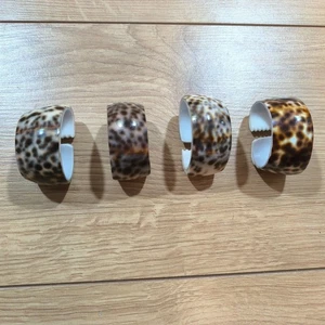 Anillos de servilleta vintage moteados Cowrie x 4 - Imagen 1 de 7