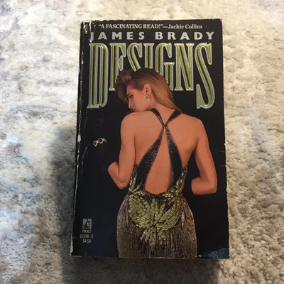 Designs James Brady 1987 Pocket Books New York Society Fashion World Paperback - Image 1 of 4