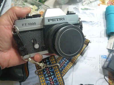 Cámara fotográfica Petri Ft 1000 35 mm con lente 1:1,8/55, 35/2,8, flash, cubierta, correa profesional Foto 1 de 4