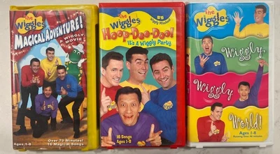 The Wiggles Magical Adventure & Hoop-Dee-Doo & Wiggly Wiggly World VHS (3) Lot - Image 1 of 4