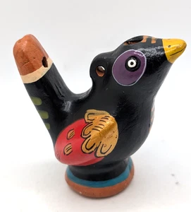 Peruanischer Vogel Wasserpfeife Handarbeit bemalt in Peru schwarz mit roten & goldenen Flügeln - Bild 1 von 7