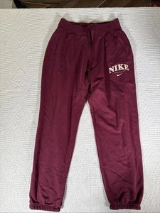 Nike Athletic Dept 1972 weinrote Jogginghose mit Bündchen Größe Small  - Bild 1 von 21