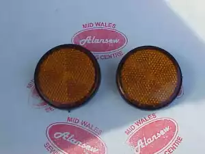MOTORRAD BERNSTEIN RUNDER REFLEKTOR PAAR 6 SEGMENTE SCHWARZE KANTE 5 MM GEWINDE - Bild 1 von 3