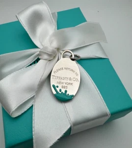 Charm Tiffany &Co.Ritorno a Tiffany Etichetta Ovale Splash Smalto Blu Ster. Argento 925 - Foto 1 di 10