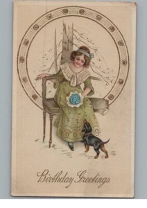 Birthday Greetings Woman in Chair With Puppy Postcard - Picture 1 of 2