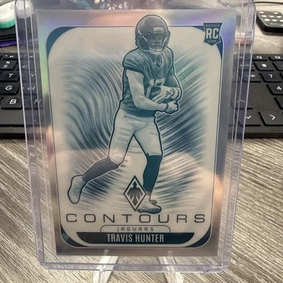 2025 Panini Phoenix #15 Travis Hunter CONTOURS Silver Rookie RC Jaguars - Image 1 of 4