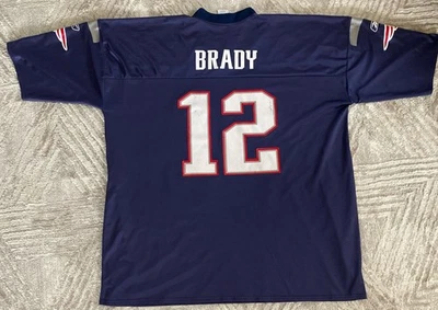 CAMISETA REEBOK TOM BRADY — NEW ENGLAND PATRIOTS — PARA HOMBRE 4XL PLAYER INC. Foto 1 de 4