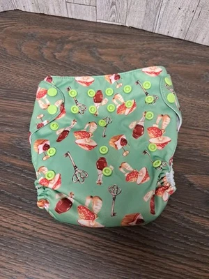 Pañal de bolsillo de tela Mama Koala con inserción de microfibra verde champiñón cupcake  Foto 1 de 3