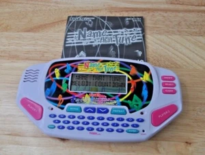 Name That Tune Electronic Handheld Game- Tiger 1997 W/ Cartridge & Manual - Picture 1 of 7