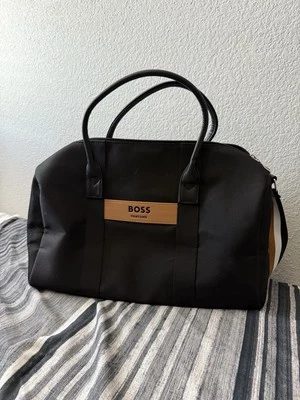 Bolso de viaje de fin de semana grande de lona negro HUGO BOSS perfumes negro para hombre Foto 1 de 2