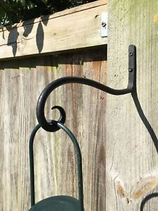 Simple curled hand made wrought iron bird feeder bracket or hook