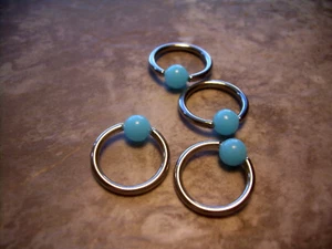 One  7/16" 11mm 14g Aqua 5mm Ball Captive Bead Ring Nipple Ear Nose Lip BB3 - Picture 1 of 2