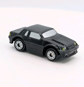Micro Machines Black 1984 Notchback Ford Mustang  - Picture 1 of 19