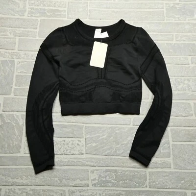 Top de malla Fabletics Jaymee para mujer mediano negro corto compresión entrenamiento gimnasio nuevo con etiquetas Foto 1 de 4