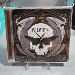 As I Lay Dying - Awakened- CD- 2012 Metalcore π€π₯π₯ - Foto 1 di 5