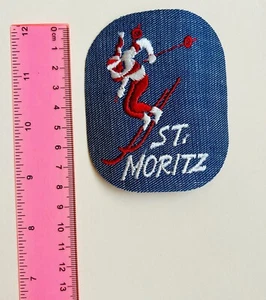 Vintage Jeans bestickt St. Moritz Bügelbild Patch Schweiz Reise - Bild 1 von 2