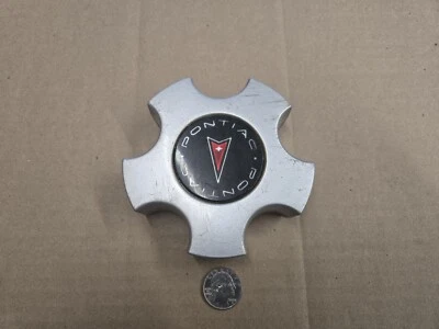 Pontiac OEM GM 2001-2005 Bonneville Montana Aztek tapa antipolvo central parte # 9593768 Foto 1 de 3