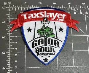 Tax Slayer Gator Bowl NCAA College Football Jacksonville Florida FL Abzeichen Aufnäher - Bild 1 von 2