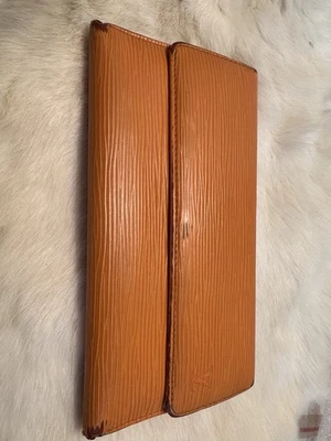 Cartera larga Louis Vuitton Epi Porte Tresor International de cuero triple pliegue naranja Foto 1 de 4