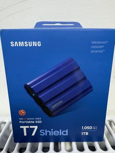 SAMSUNG T7 Shield 1TB Solid State Drive SSD Blue Brand New Still Sealed BNIB - Bild 1 von 3