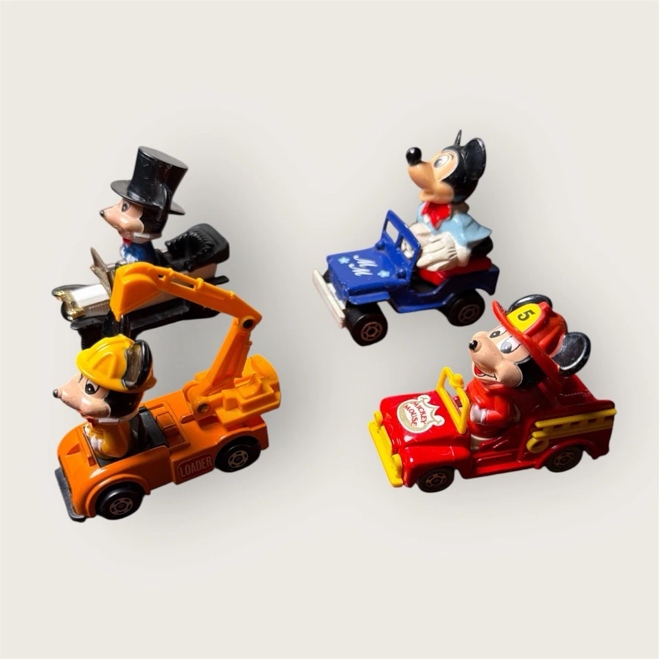 Vintage Konvolut 4 Matchbox und TOMY Diecast Mickey Mouse Spielzeugautos Disney 70er 80er - Bild 1 von 4