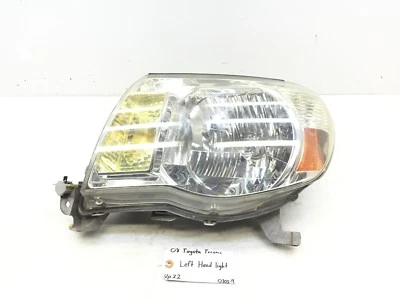 Faro izquierdo del conductor Toyota Tacoma 2005-2011 OEM Foto 1 de 4