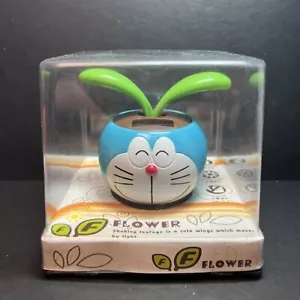 New Solar Powered Dancing Toy Bobblehead - From China Flip Flap DOREMON Pot - Picture 1 of 1