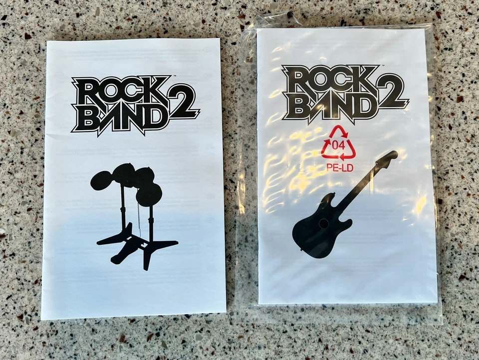 Rock Band 2 Wireless Guitar Instructions & Drum Assembly Instructions - Image 1 of 1