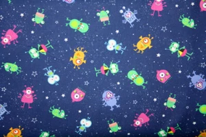 SPACE MONSTERS IN NAVY BLUE FROM MICHAEL MILLER - 100% COTTON FABRIC - Picture 1 of 5