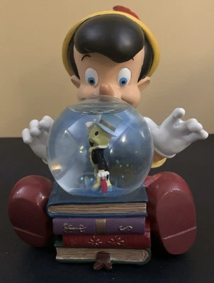 Caja de música Globo de nieve de cricket Pinocho y Peñique de los parques de Disney - funcionando nueva en caja Foto 1 de 4