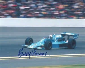 BOBBY UNSER HAND SIGNED 8x10 COLOR PHOTO+COA        GREAT ACTION POSE IN #6 CAR - Picture 1 of 1