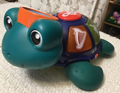 Baby Einstein Baby Neptune OCEAN ORCHESTRA - Luces Colores y Música Clásica Foto 1 de 4